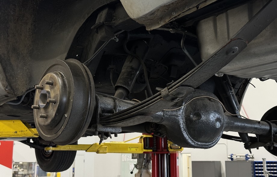 A leaf spring suspension system, which was standard on many early muscle cars and pickup trucks.