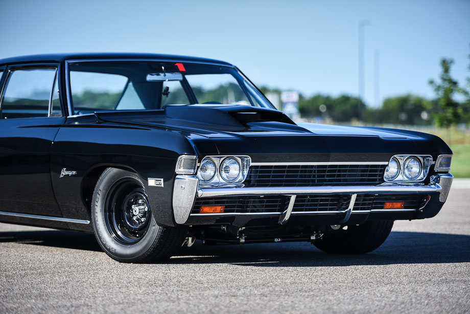 The front end of a black 1968 Chevrolet Biscayne with big block Chevy power and QA1 suspension.