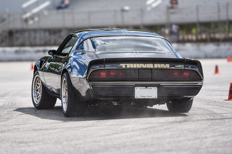 2nd gen Pontiac Trans Am with an LSX swap cornering at an autocross track.