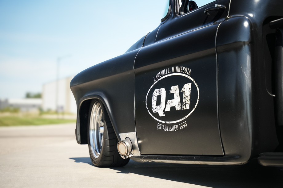 Rear view of Rob McPherson’s 1956 Chevy 3100, showcasing the custom 4-link suspension and wide rear tires.